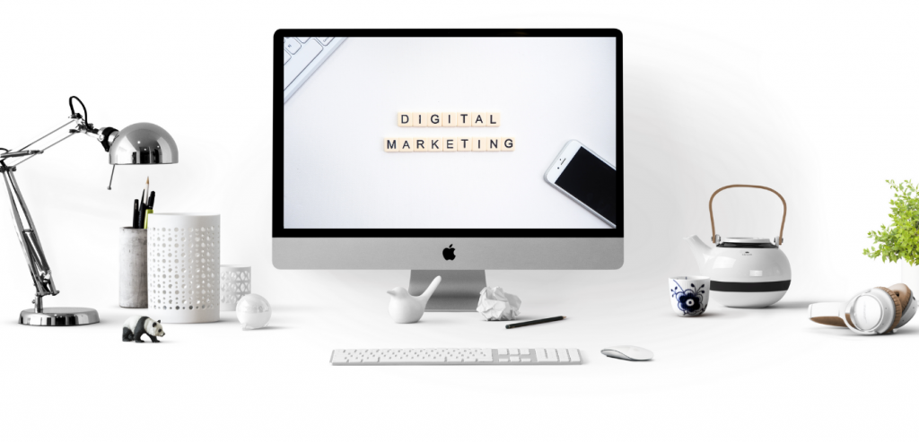 Digital Marketing Services with Imac system, mobile, keyboard and a mouse